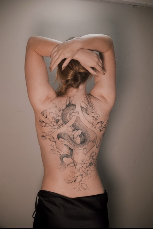 backpiece tattoo. dragontattoo floraltattoo